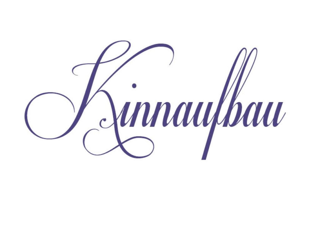 Die Grafik zeigt den Schriftzug „Kinnaufbau“.